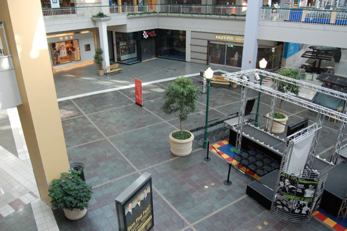 Parks Mall, food court plaza seen from above with a patterned tile floor