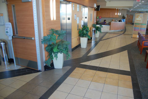 John Peter Smith Hospital, lobby floor with dark tile bands crossing a light field