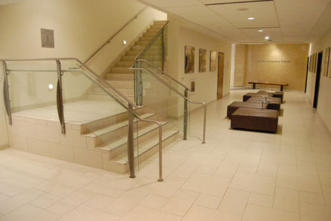 SMU Caruth Hall, open stair and lobby with a stone floor