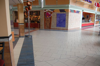 Town East Mall food court, tile floor with blue band