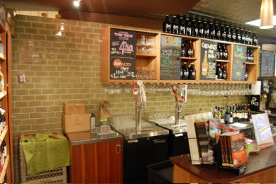 Whole Foods, bar with brick-pattern tile wall